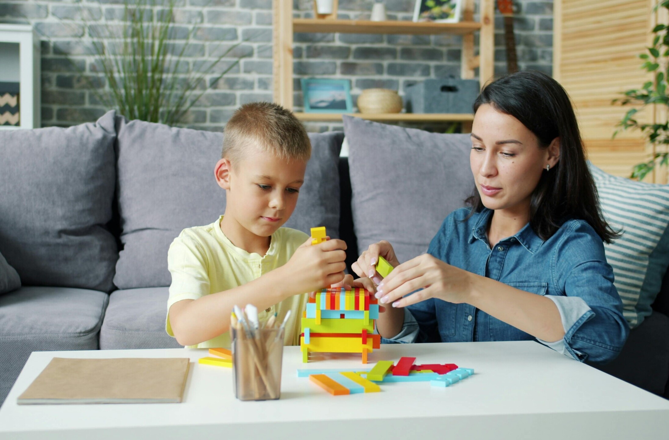 Child participating in LEGO therapy session